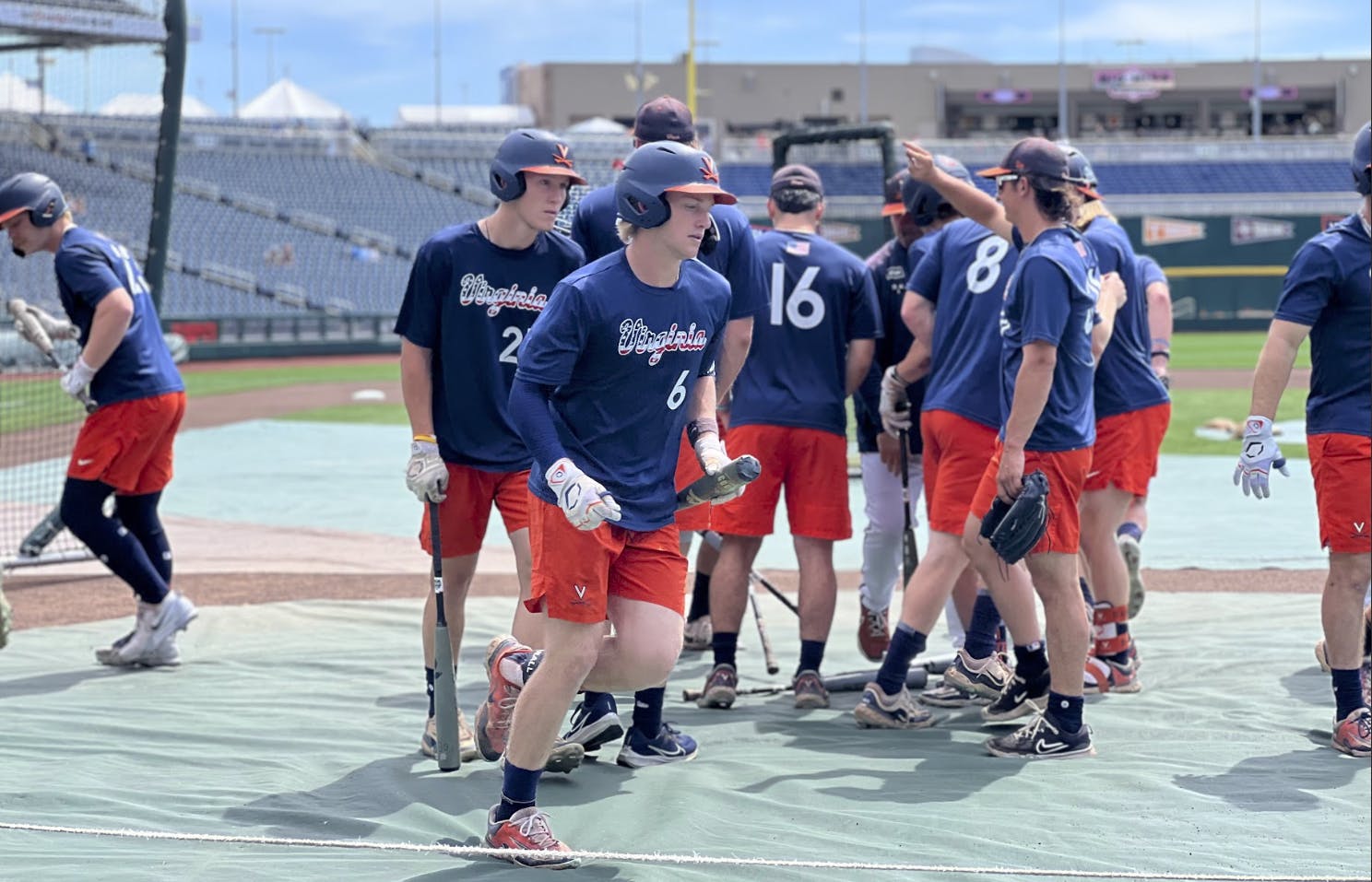 The Cavaliers disperse to begin warming up for their Friday afternoon game against the Tar Heels.