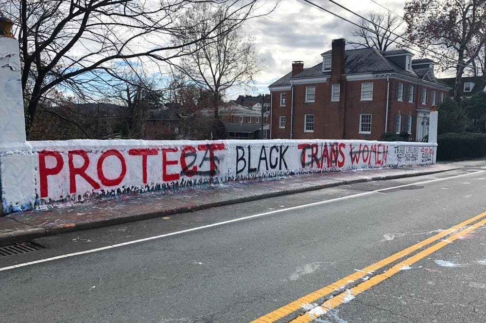 <p>A few weeks after the original message was painted, it was defaced with scrawls of pro-gun rhetoric in an act of violent hate speech against the transgender community.</p>