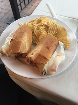 For main dishes, the paninis and subs particularly caught my attention, and I selected the classic "eggplant parmegiana."