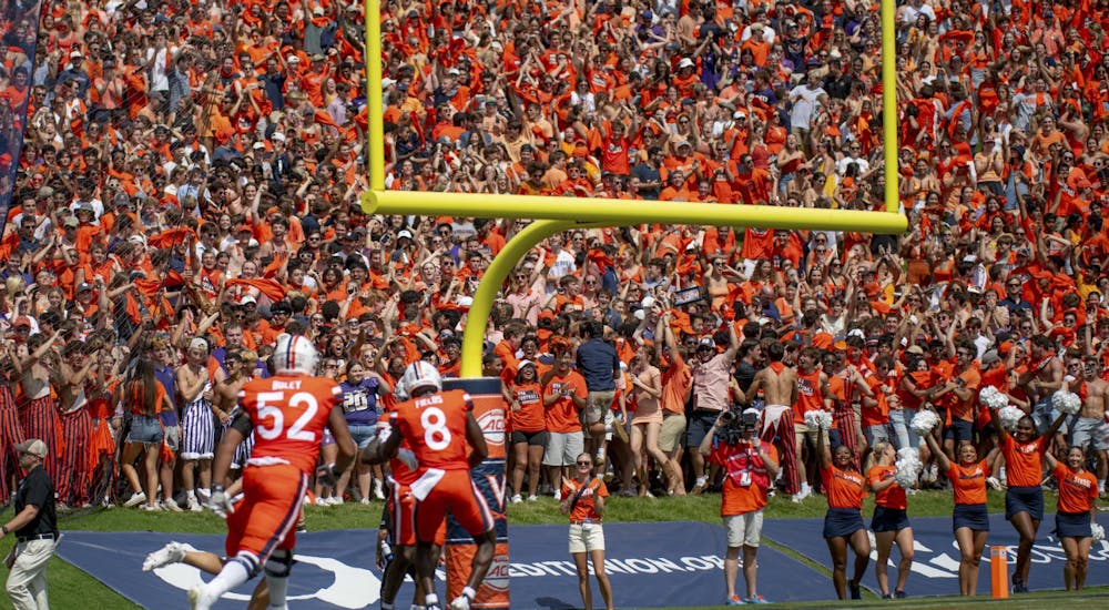 Virginia celebrates a touchdown against James Madison.