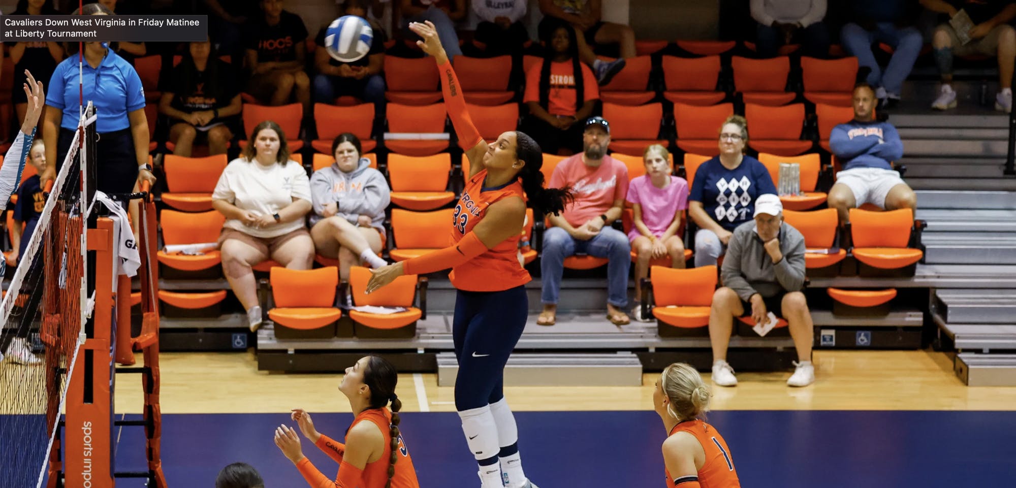 Sophomore outside hitter Lauren Bowie goes in for a kill to give the Cavaliers another point.