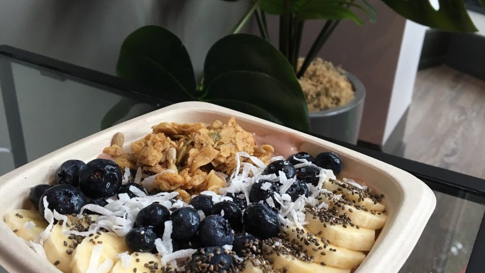 The House Açai Bowl includes an açai, banana, mango and almond milk base and is topped with bananas, blueberries, Hudson Henry granola, chia seeds and coconut shavings.