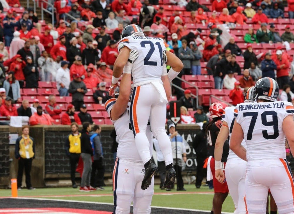 Sophomore running back Wayne Taulapapa scored a pair of touchdowns in a loss to Louisville.