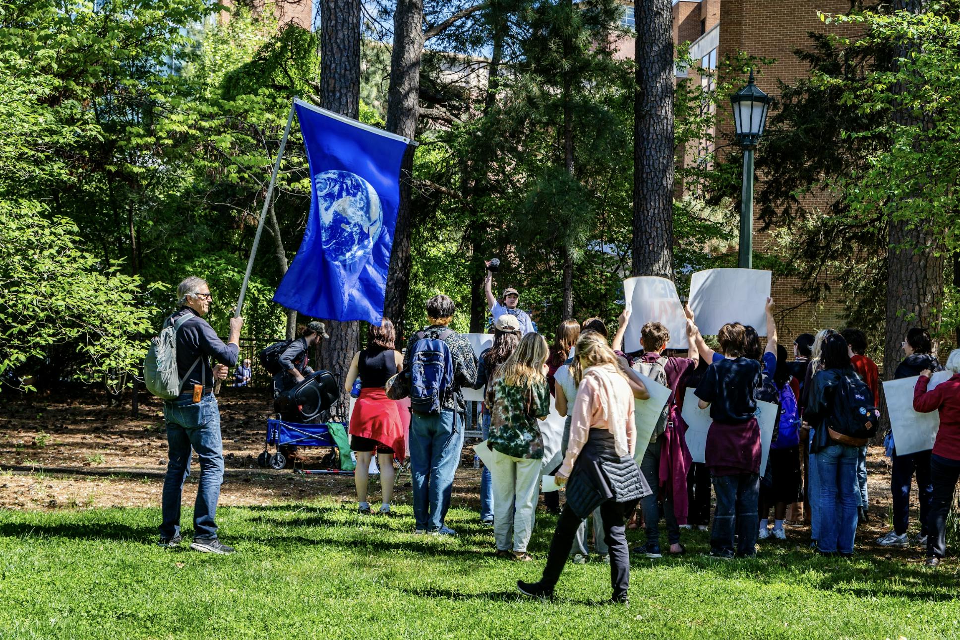 The rally began on the North side of the Rotunda from and included both University students as well as Charlottesville community members.