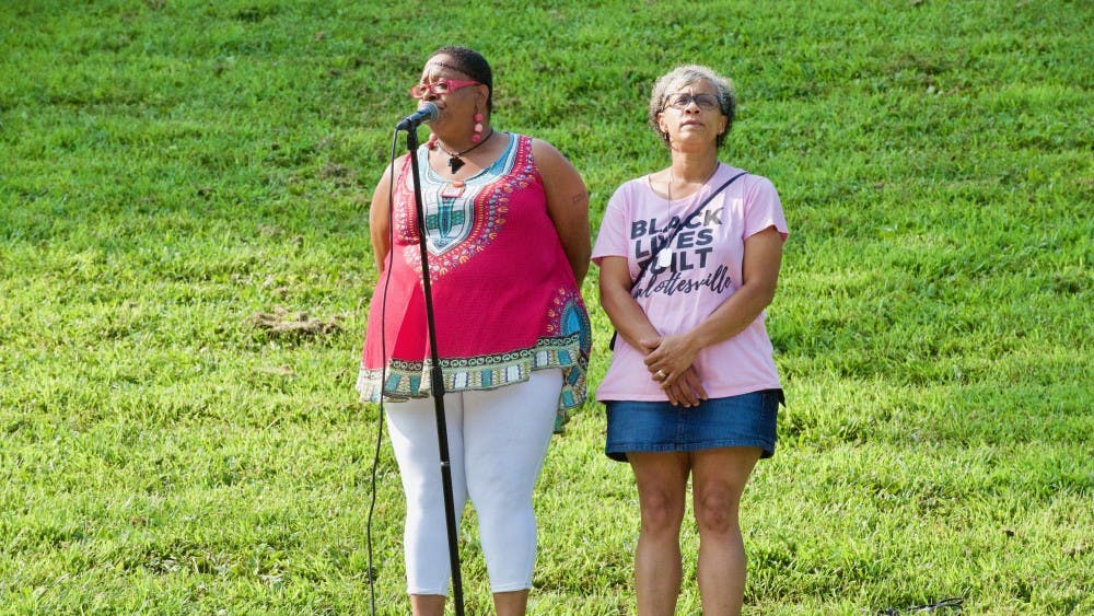 Rosia Parker (left) and Katrina Turner (right), both Charlottesville residents and members of the City's Police Civilian Review Board, spoke at Sunday's rally.&nbsp;