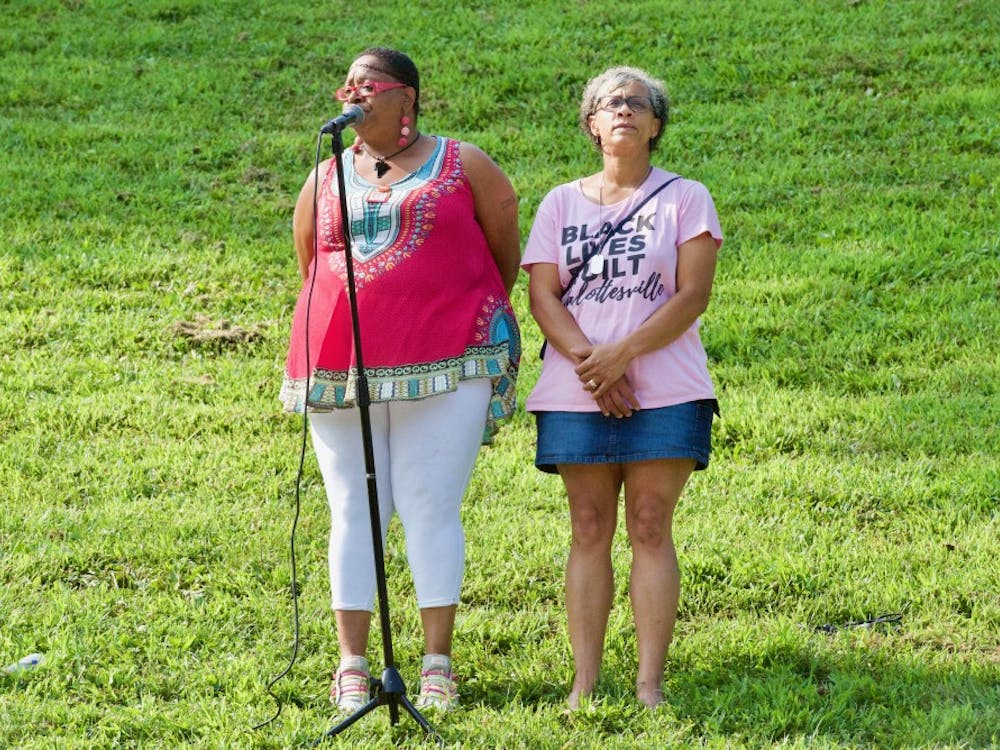 Rosia Parker (left) and Katrina Turner (right), both Charlottesville residents and members of the City's Police Civilian Review Board, spoke at Sunday's rally.&nbsp;