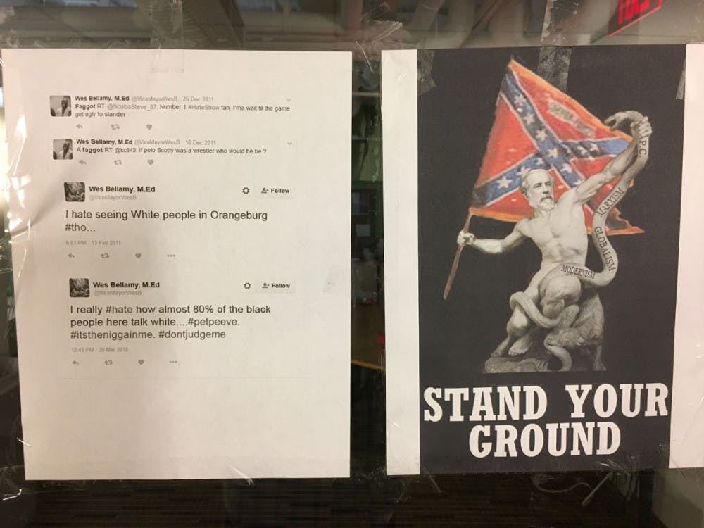 <p>Old Bellamy tweets (left) and doctored photo of Robert E. Lee statue with Confederate flag (right) taped to the Multicultural Student Center windows</p>