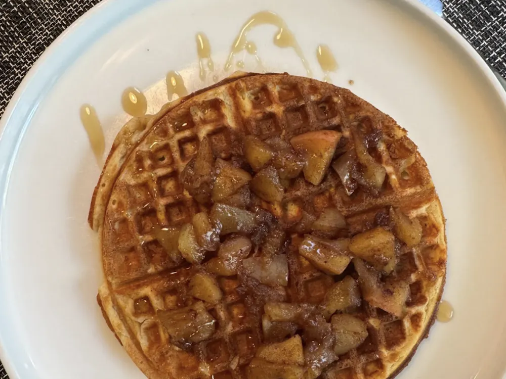 The waffles themselves are lightly spiced and gently sweet and crisp around the edges with a soft, cake-like center.