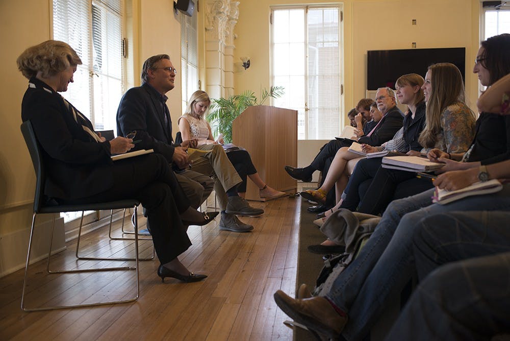 Panelists discuss practices of sustainable urban planning. 