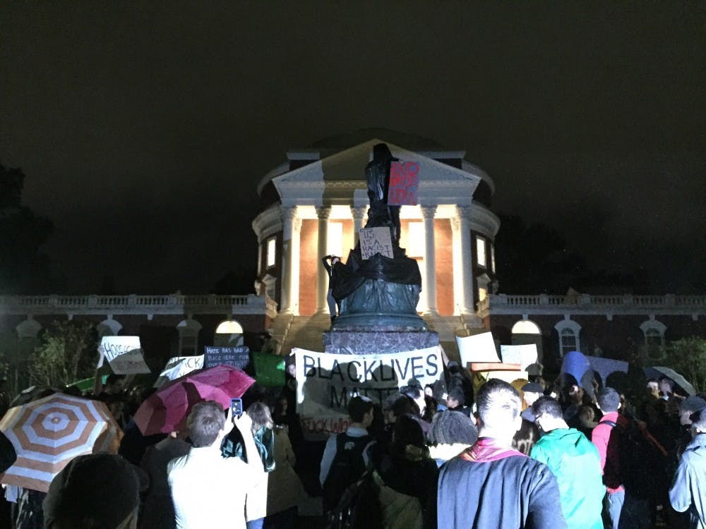 U.Va. student protesters covered the Thomas Jefferson statue in front of the Rotunda, many of whom called for its removal.&nbsp;