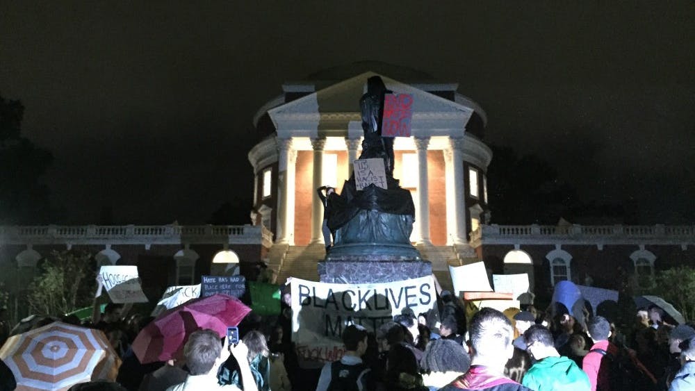 U.Va. student protesters covered the Thomas Jefferson statue in front of the Rotunda, many of whom called for its removal.&nbsp;