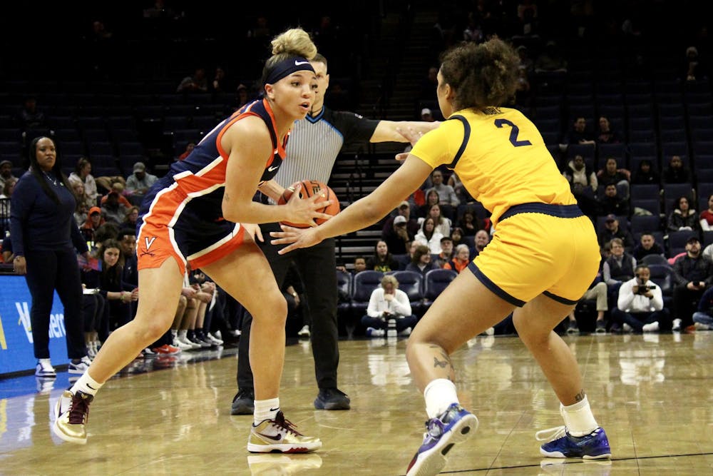 Kymora Johnson maneuvers around a California defender.