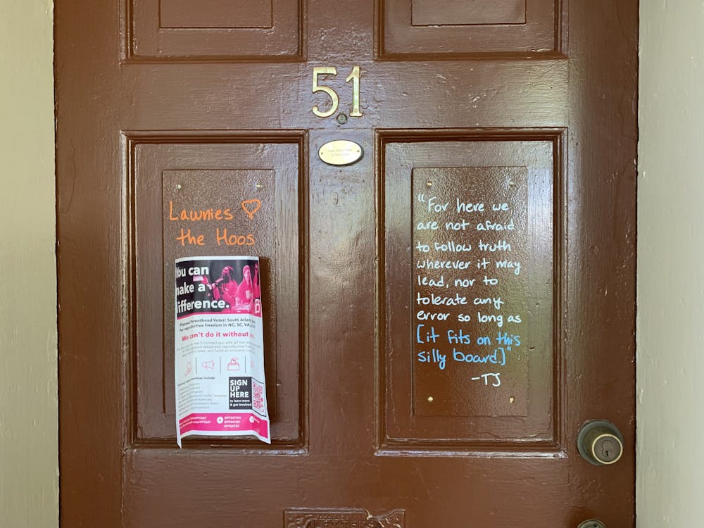 Lawn residents are limited to signage within the four corners of the boards on their doors, which is sometimes smaller than the size of a standard piece of paper.