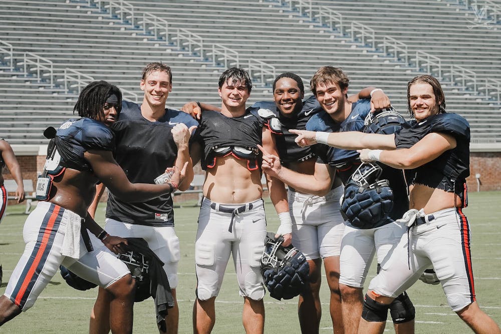 <p>Sophomore tight end Sackett Wood Jr., third from left, endured a grueling tryout process in the fall of 2020 to join the Virginia football team.</p>