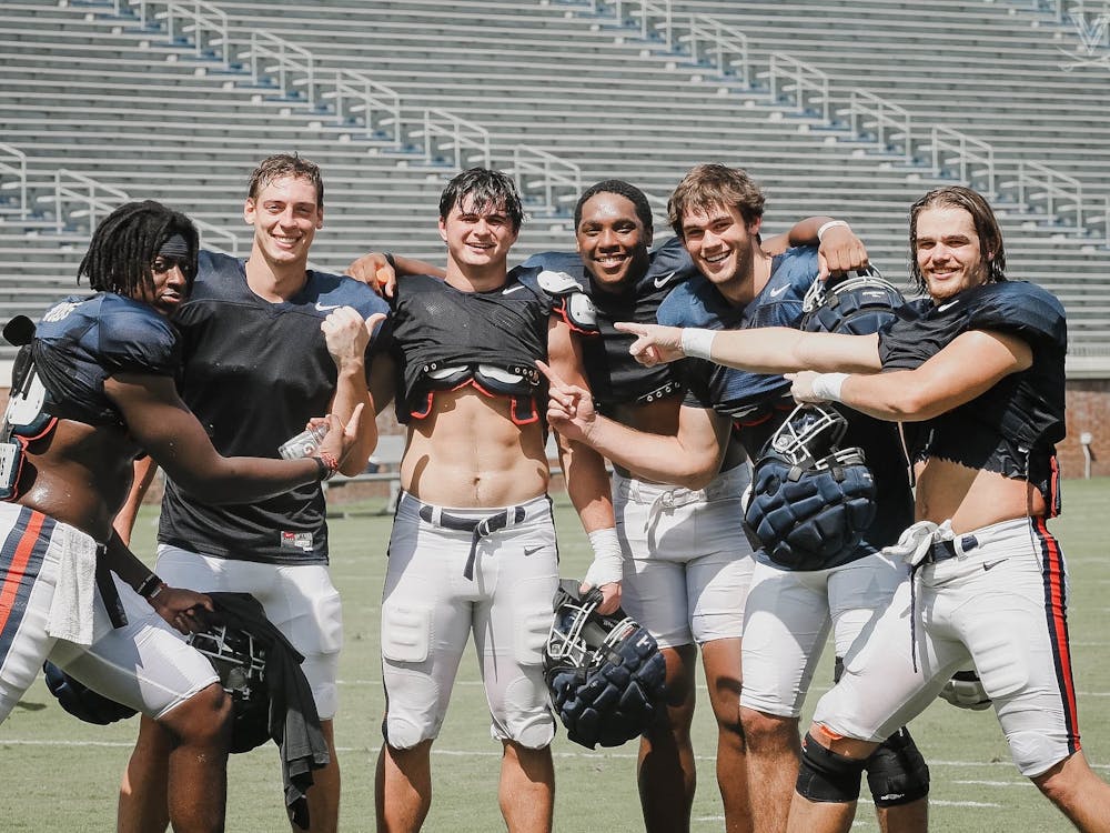 Sophomore tight end Sackett Wood Jr., third from left, endured a grueling tryout process in the fall of 2020 to join the Virginia football team.
