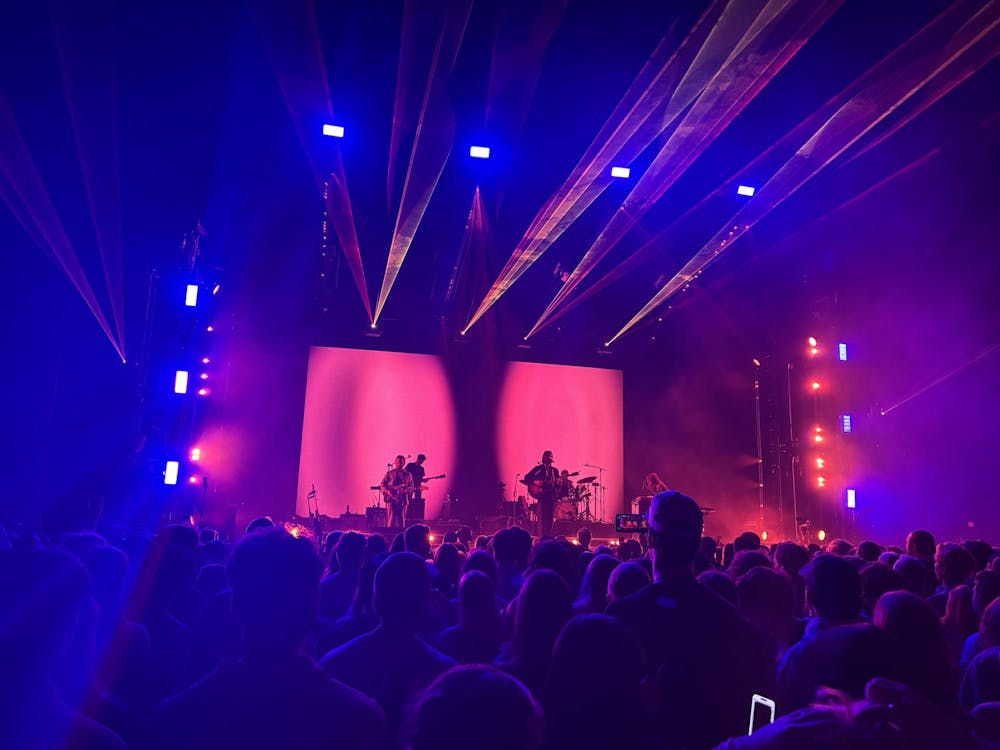 Throughout the performance, the crowd buzzed with energy — clapping along to songs, screaming lyrics, holding up signs and flashlights and doing plenty of dancing.