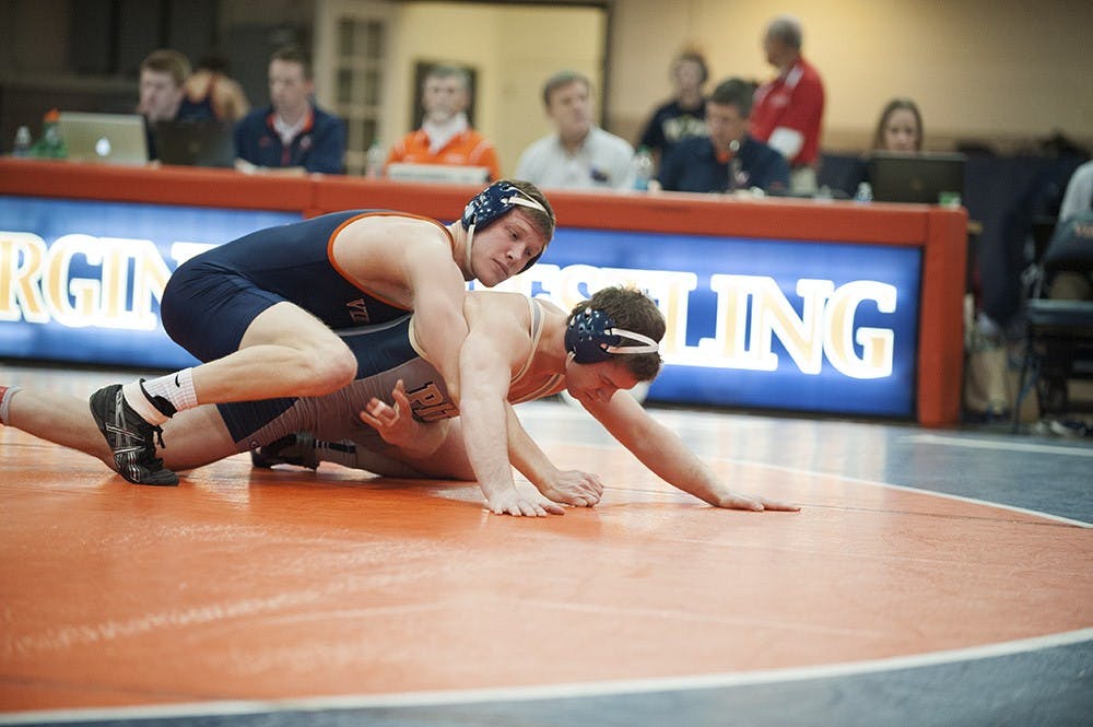 Senior Nick Sulzer and the Virginia wrestling team face a stiff test in top-ranked Iowa. The Cavaliers and Hawkeyes get going at 2 p.m. Sunday. 