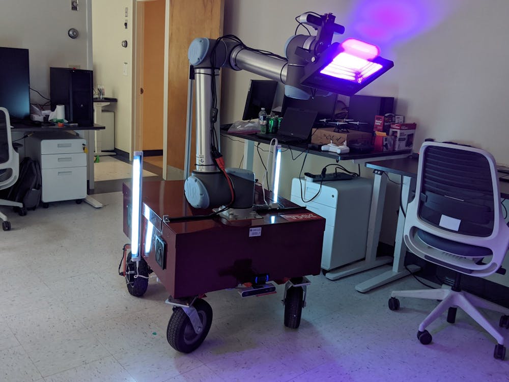 University professor Tomonari Furukawa and his team of graduate students developed a robot to decontaminate surfaces using UV light and hope to collaborate with the University Health System and other facilities to test and use the robot in clinical settings. 