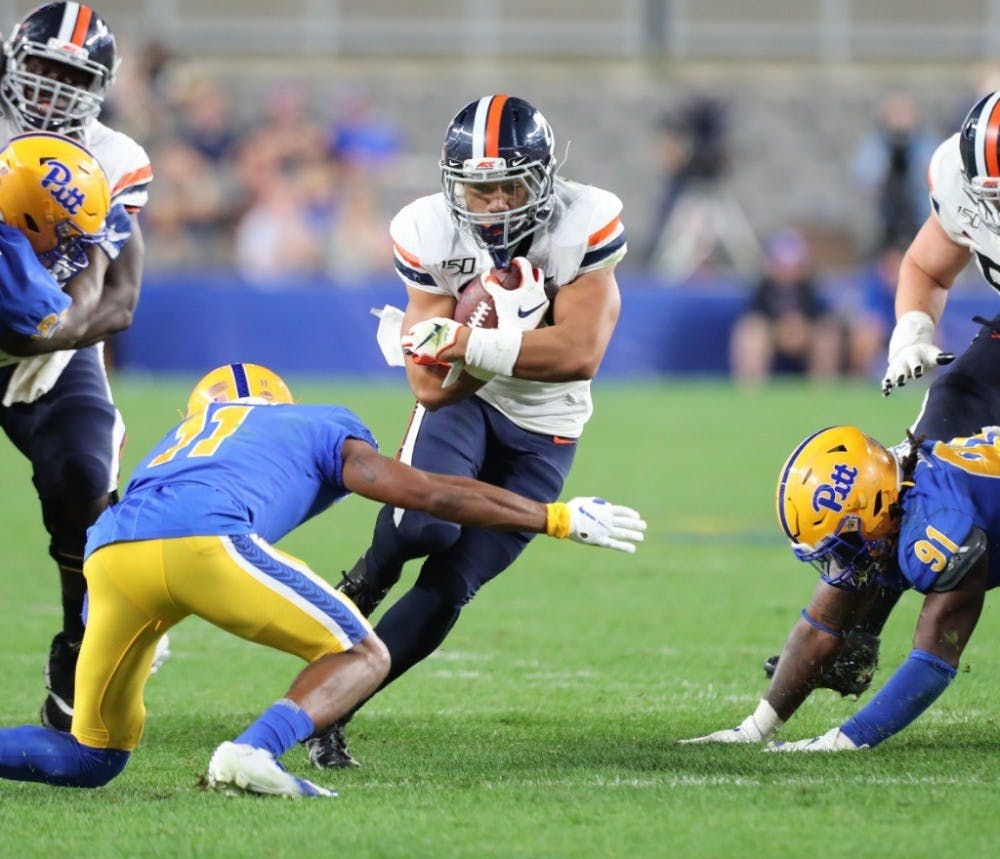 <p>Sophomore tailback Wayne Taulapapa has established himself early as Virginia's lead running back for 2019.</p>