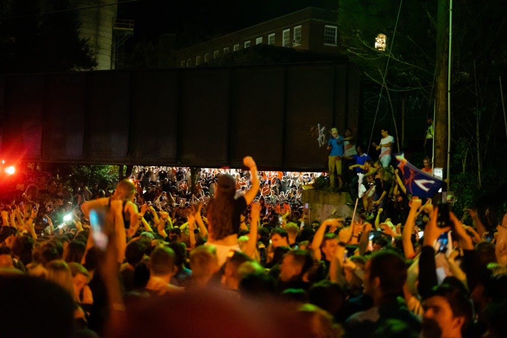 Students celebrate on the Corner after U.Va. wins its first basketball national championship in school history.&nbsp;