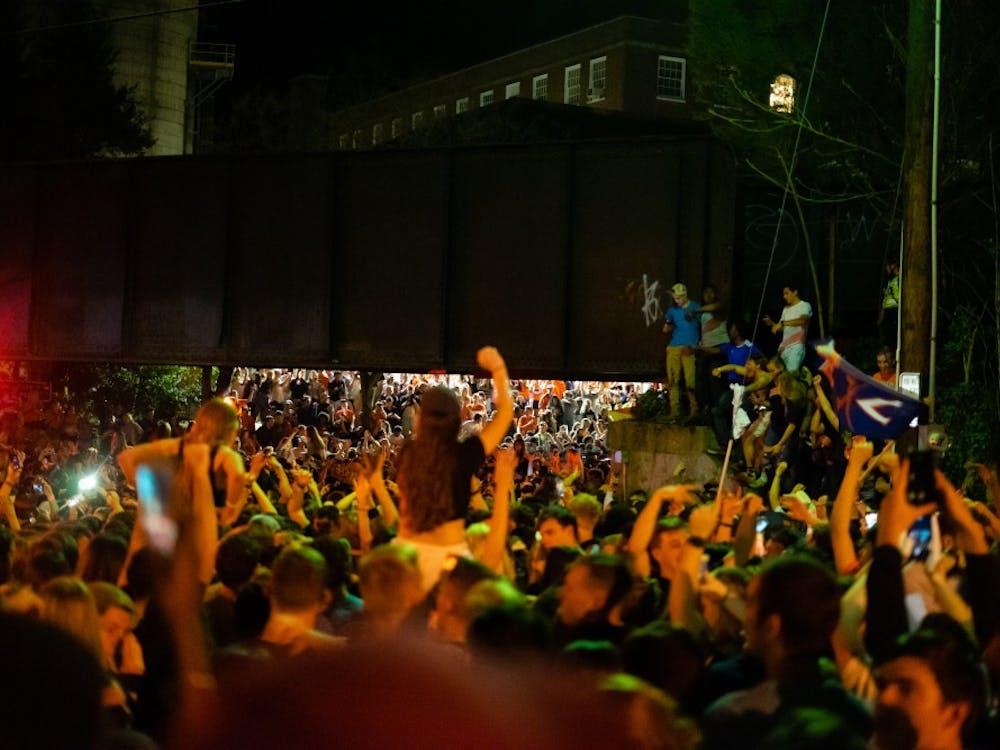 Students celebrate on the Corner after U.Va. wins its first basketball national championship in school history.&nbsp;