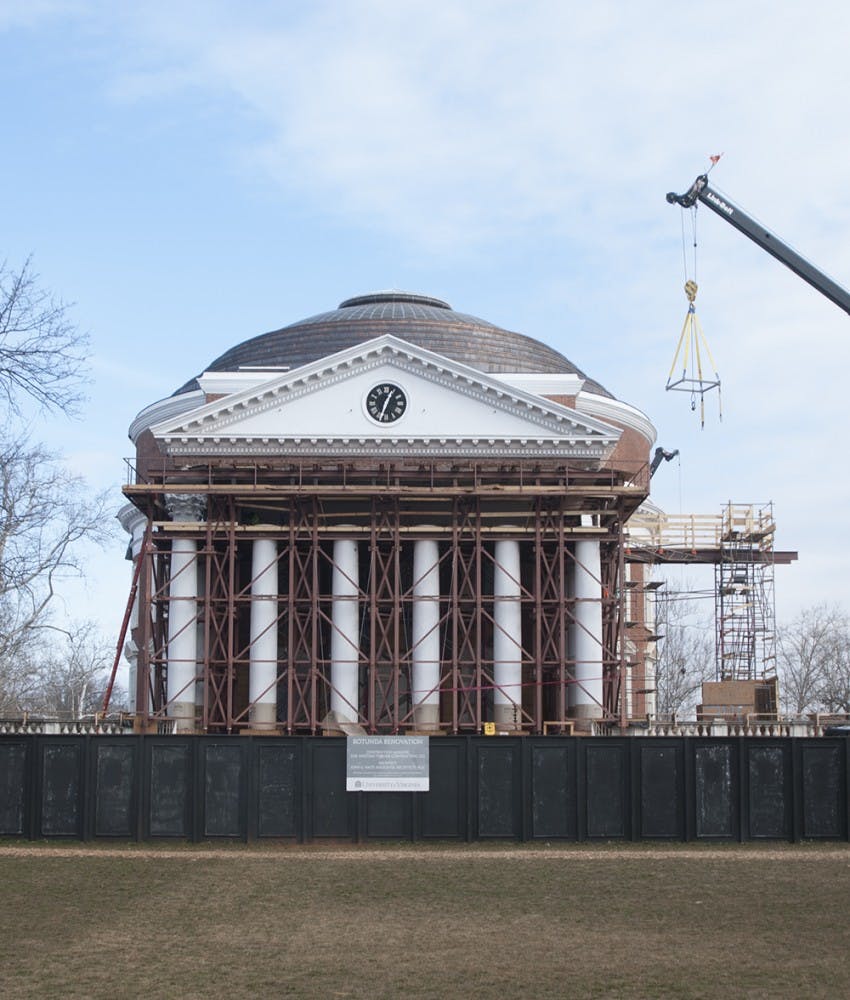 University President Teresa Sullivan said the architects ran into unexpected delays recently, such as encountering a vein of granite where utility pipes were meant to be installed.