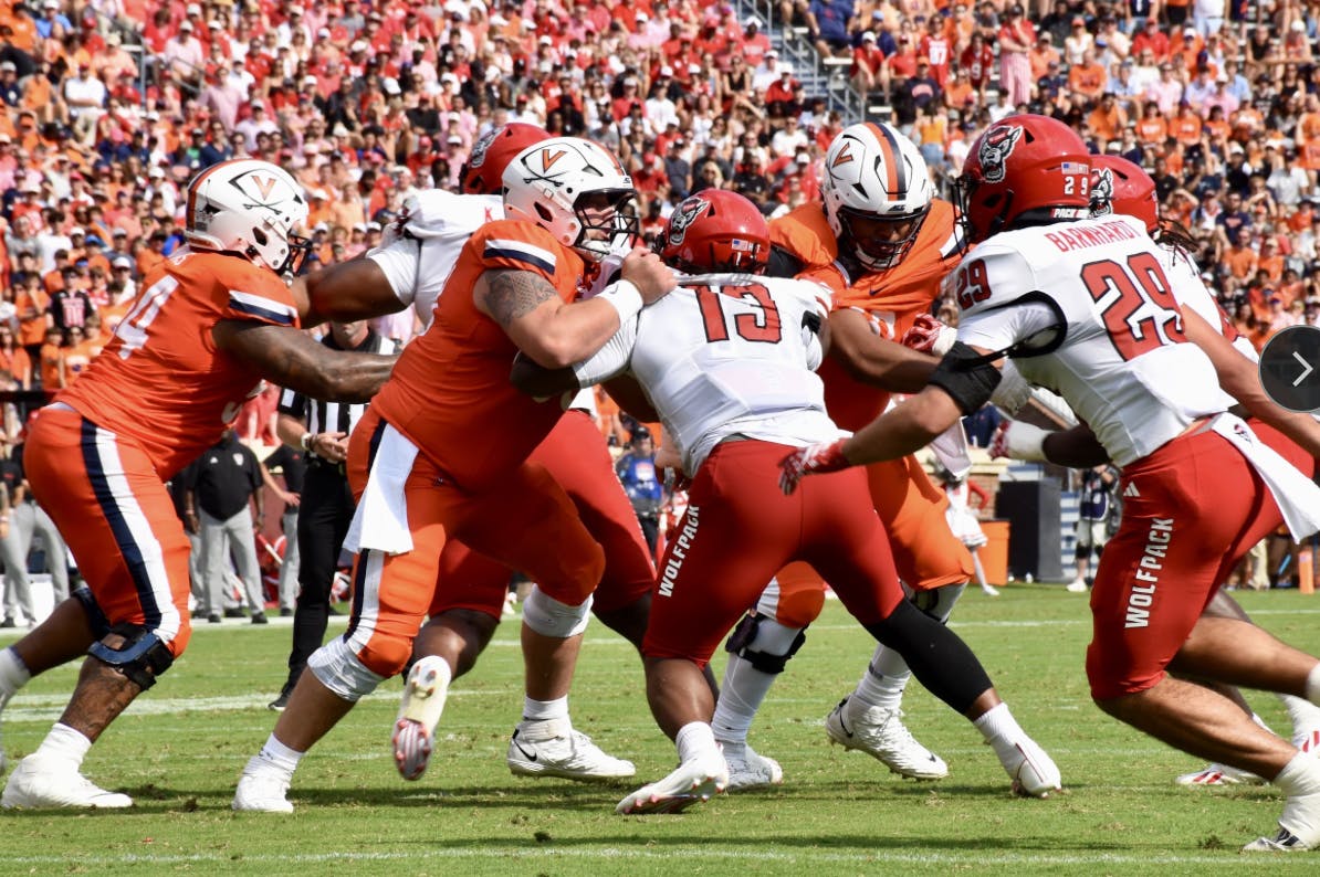 Both sides of the Cavalier trenches displayed dominance in their opening victory over N.C. State