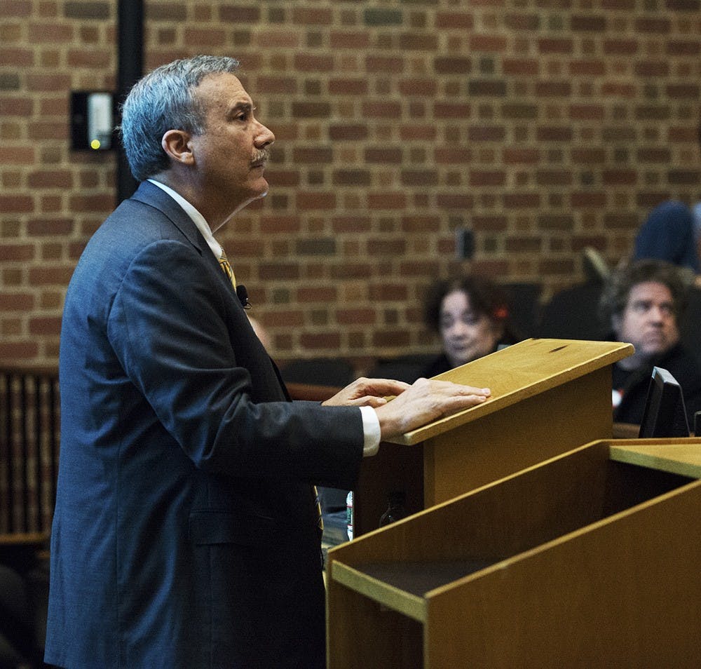 Politics professor Larry Sabato announced his predictions for Tuesday's midterm elections at the Crystal Ball on Monday night.