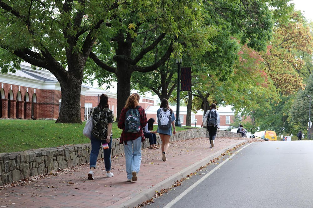 Students walk to class along McCormick Road Sept. 25, 2023.