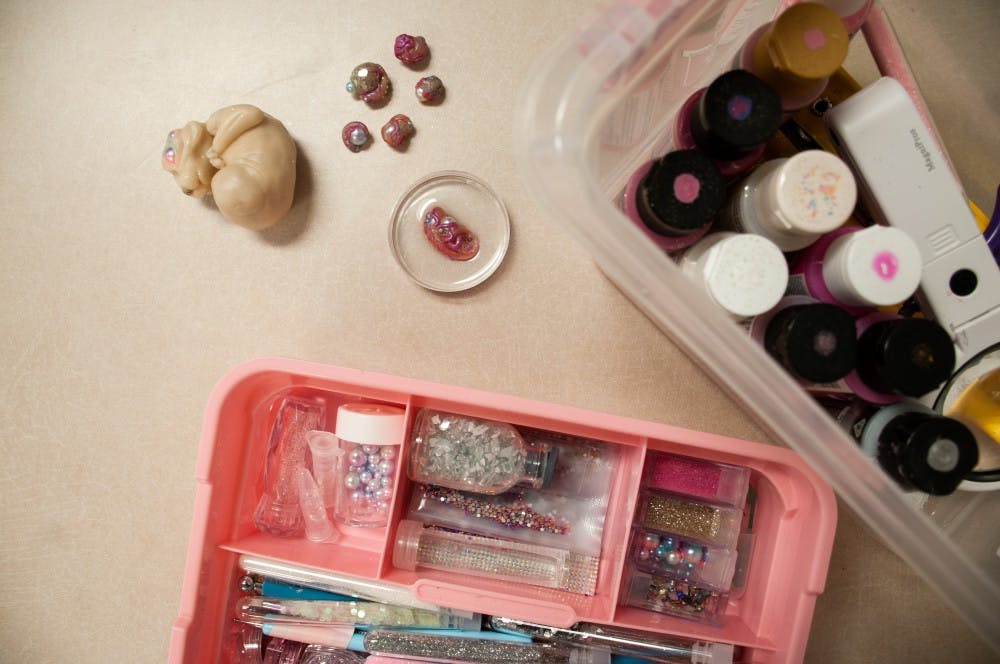 Through sculpting, Margaret Kim utilizes her science background to envision the formation of life for a new fictional species.&nbsp;