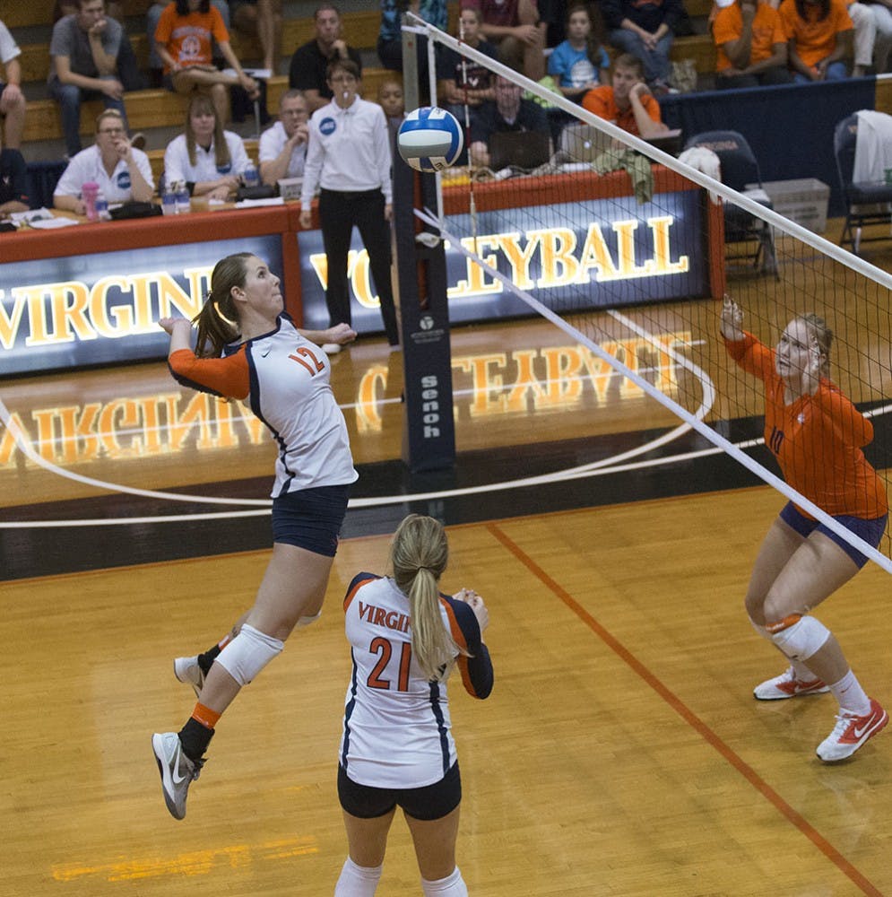 According to coach Dennis Hohenshelt, junior middle hitter Natalie Bausback is Virginia's "go-to person" at the moment. "We have to get her the ball," he said.