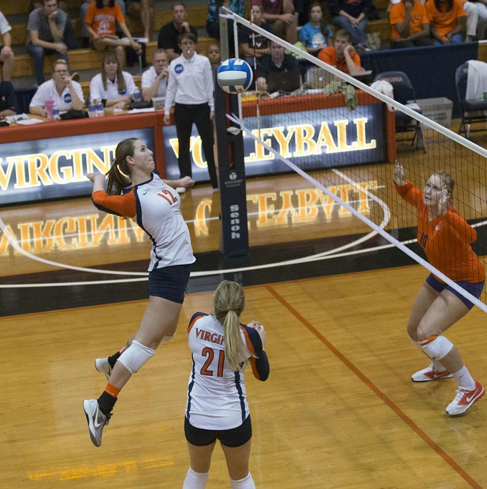 <p>According to coach Dennis Hohenshelt, junior middle hitter Natalie Bausback is Virginia's "go-to person" at the moment. "We have to get her the ball," he said.</p>