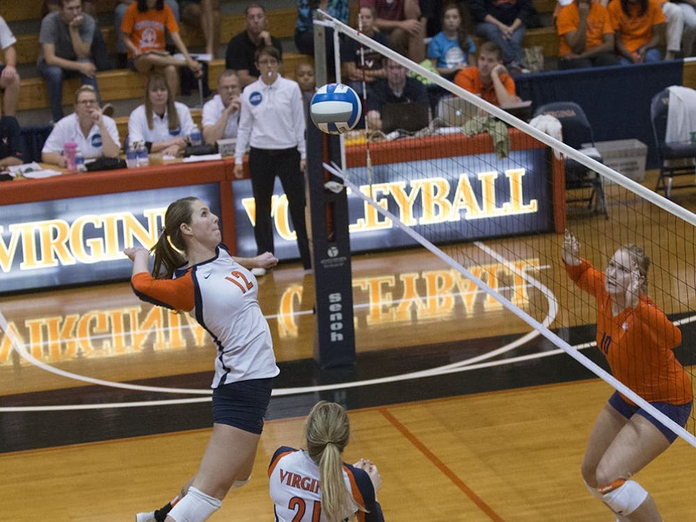 According to coach Dennis Hohenshelt, junior middle hitter Natalie Bausback is Virginia's "go-to person" at the moment. "We have to get her the ball," he said.