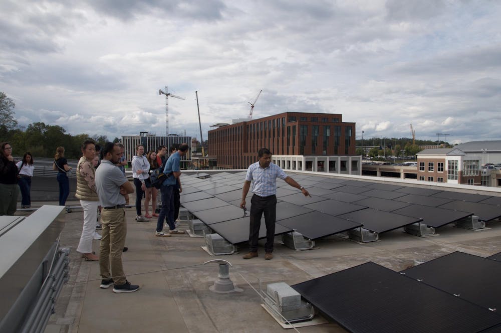 The Infrastructure Month included a tour of the rooftop solar installation of the School of Data Science photographed Oct. 7