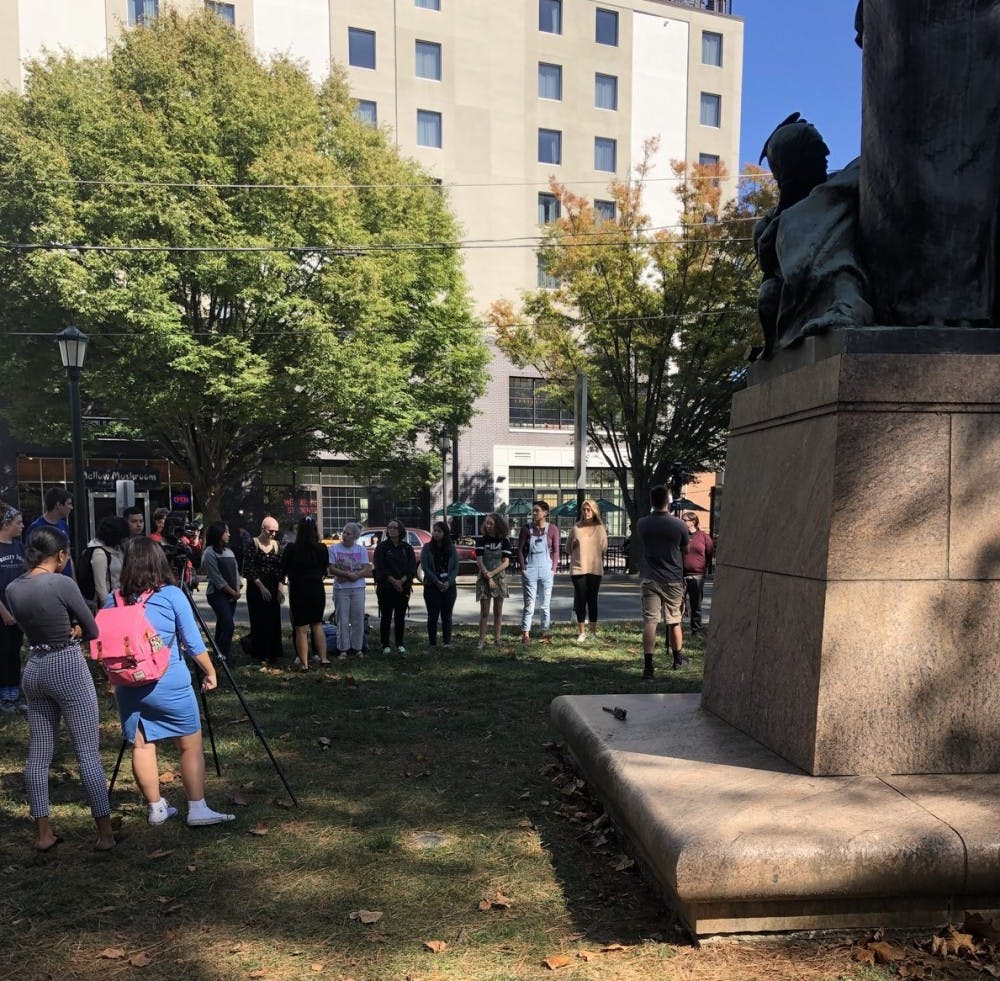 Participants marched along the Corner to the George Rogers Clark statue on West Main Street.