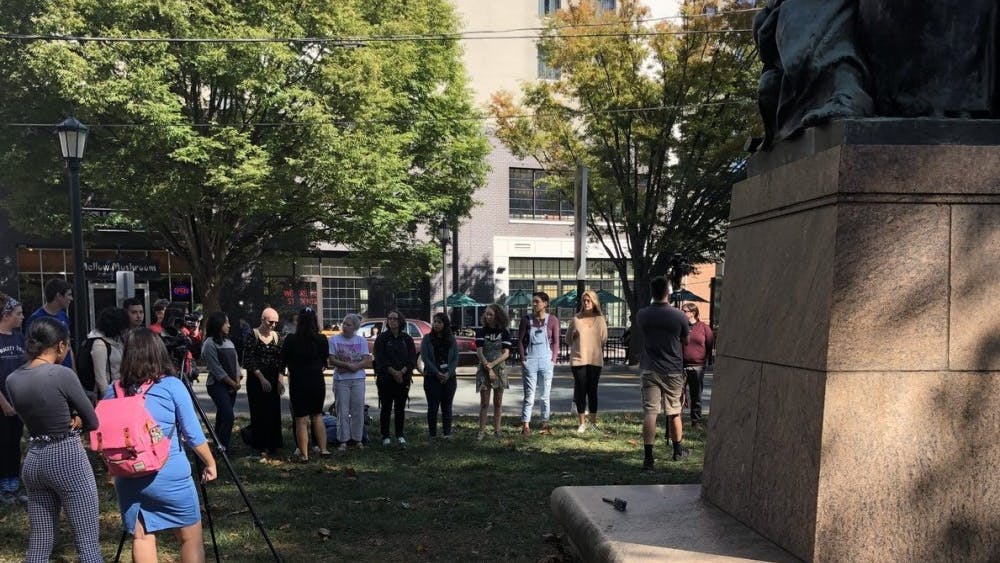 Participants marched along the Corner to the George Rogers Clark statue on West Main Street.