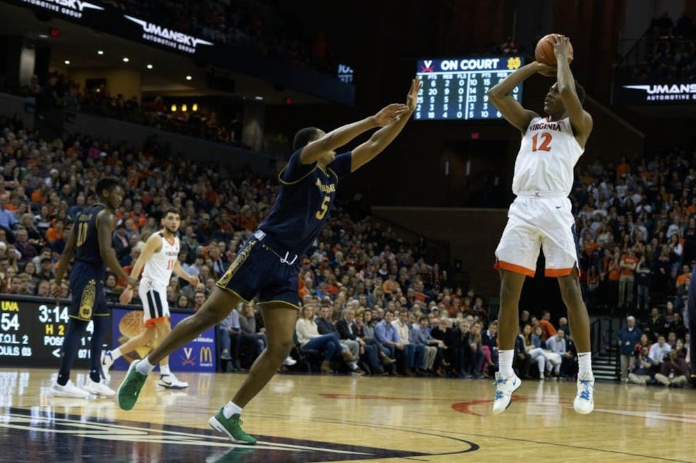 De'Andre Hunter fires a jump shot against Notre Dame Feb. 17, 2019.