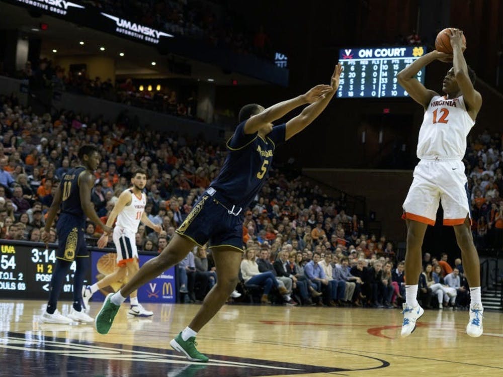 De'Andre Hunter fires a jump shot against Notre Dame Feb. 17, 2019.