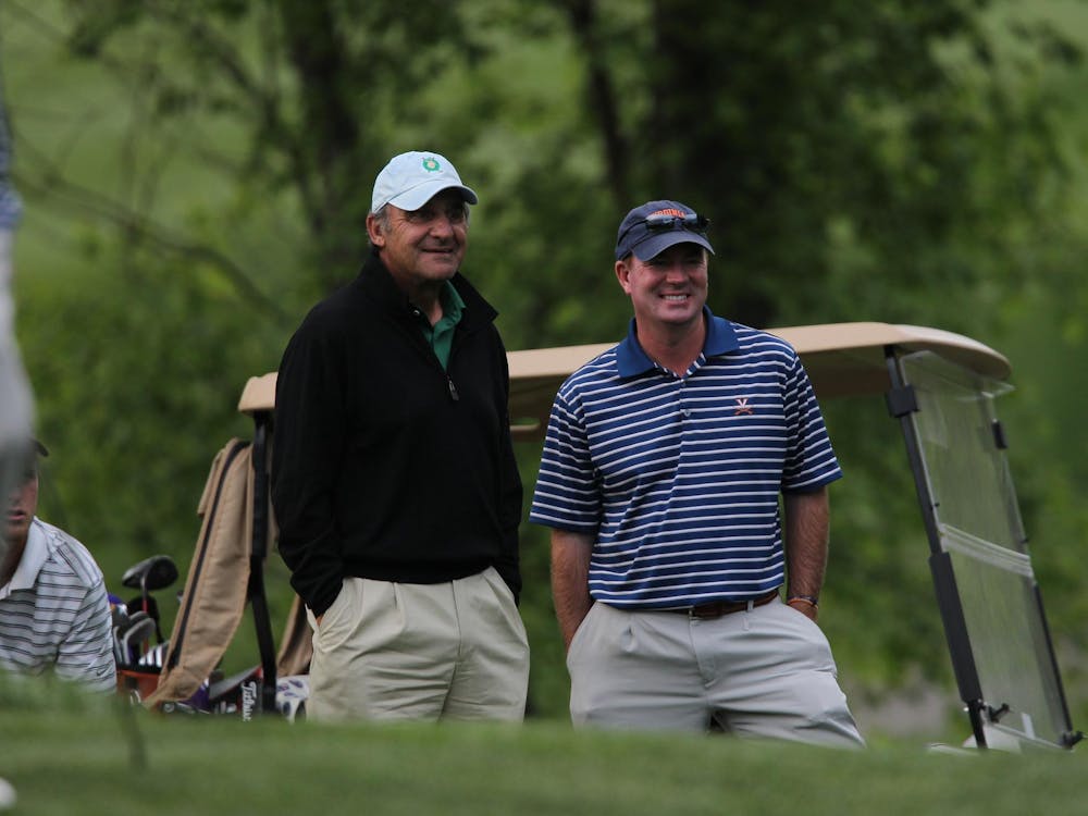 Dr. Bob Rotella and Coach Bowen Sargent, on the course somewhere along the way of a fruitful two-decade working relationship.