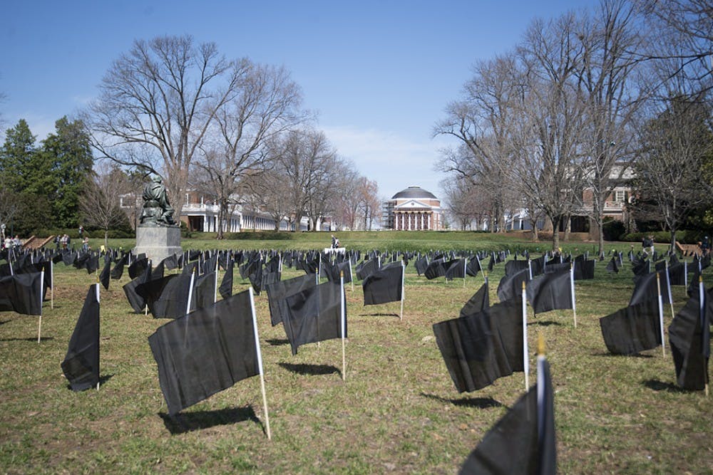 In the spring, the CIO placed 1,100 black flags on Grounds to represent every student who committed suicide in the past year.