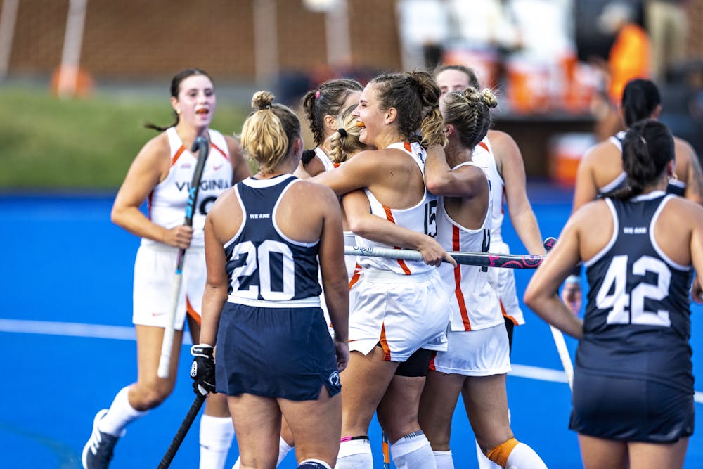 <p>Striker Laura Janssen celebrates with teammates after notching a goal.</p>