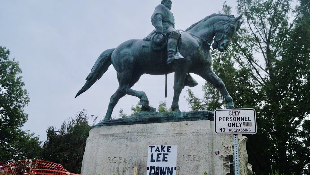 The Charlottesville community gathered Wednesday in remembrance of the three-year anniversary of the violent Aug. 12, 2017 white supremacist rally. As part of the commemoration, organizers hosted a Reclaim the Park event at the site of the Lee statue. (Photos by Sophie Roehse | The Cavalier Daily)