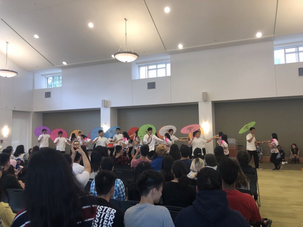 Vivid traditional Chinese umbrellas opened and closed to the beat of various styles of music as the smell of freshly-cooked Chinese food filled the air.&nbsp;