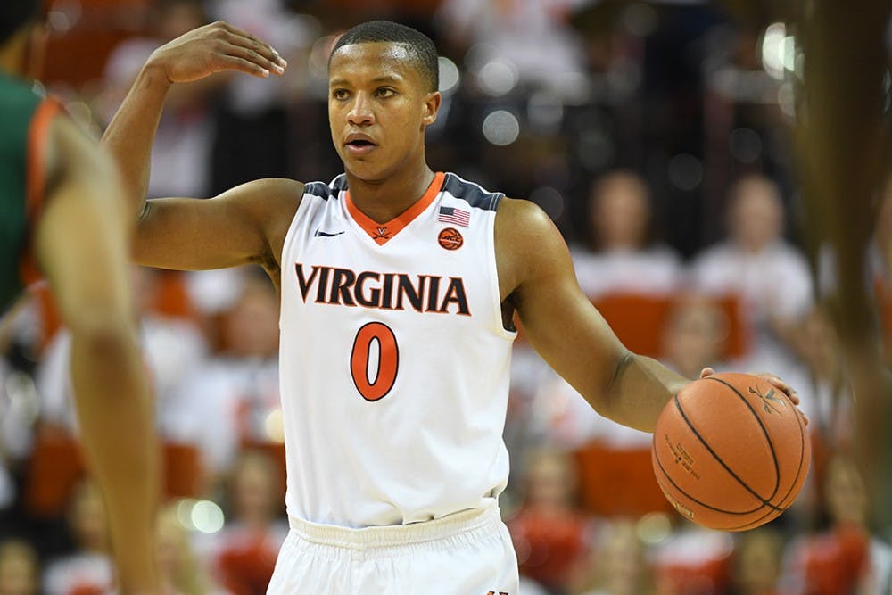 <p>Although improving his average to 8.4 points per game, junior guard Devon Hall has not been able to lift the Virginia offense.</p>