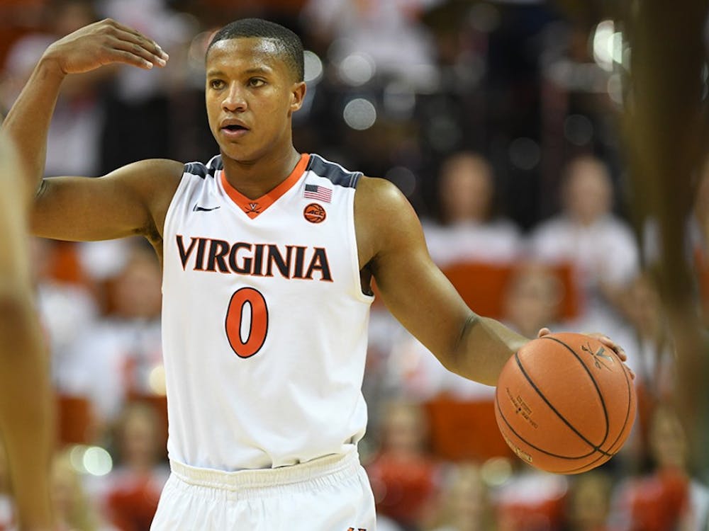 Although improving his average to 8.4 points per game, junior guard Devon Hall has not been able to lift the Virginia offense.