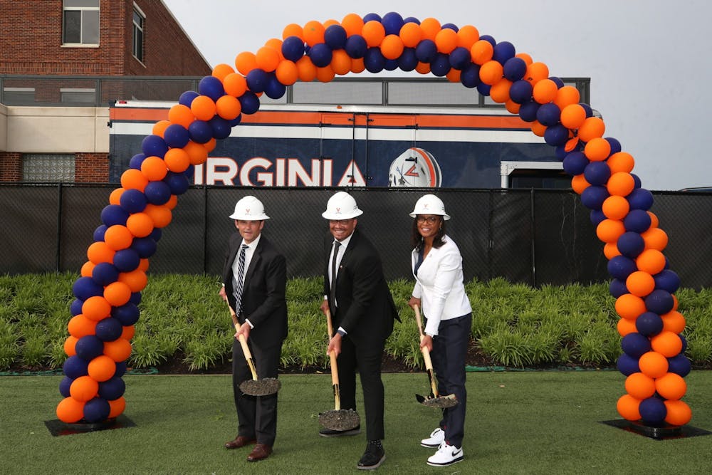 <p>University President Jim Ryan, football Coach Tony Elliott and Athletic Director Carla Williams have all played an integral role in the progress of Virginia Athletics' Master Plan.</p>