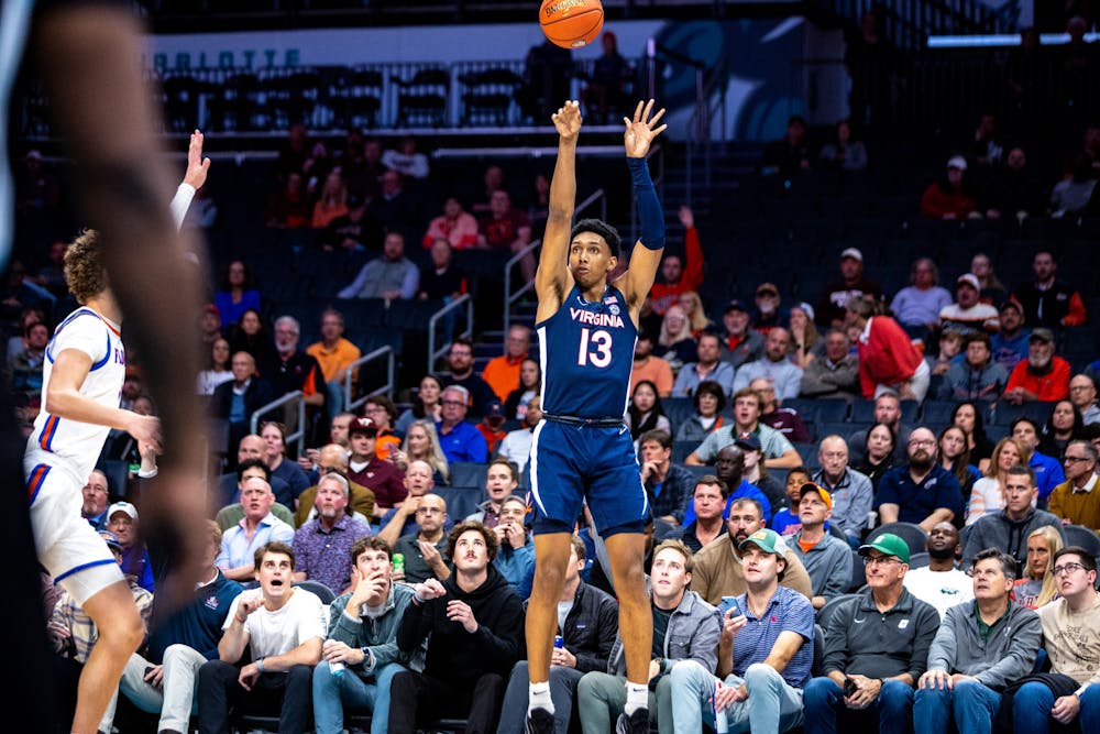 <p>Dunn hoists up a three-point shot against Florida in 2023.</p>