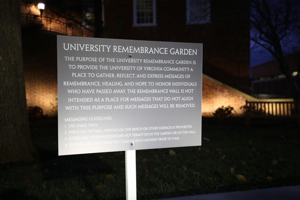 The signs outline the intended purpose of the University Remembrance Garden.