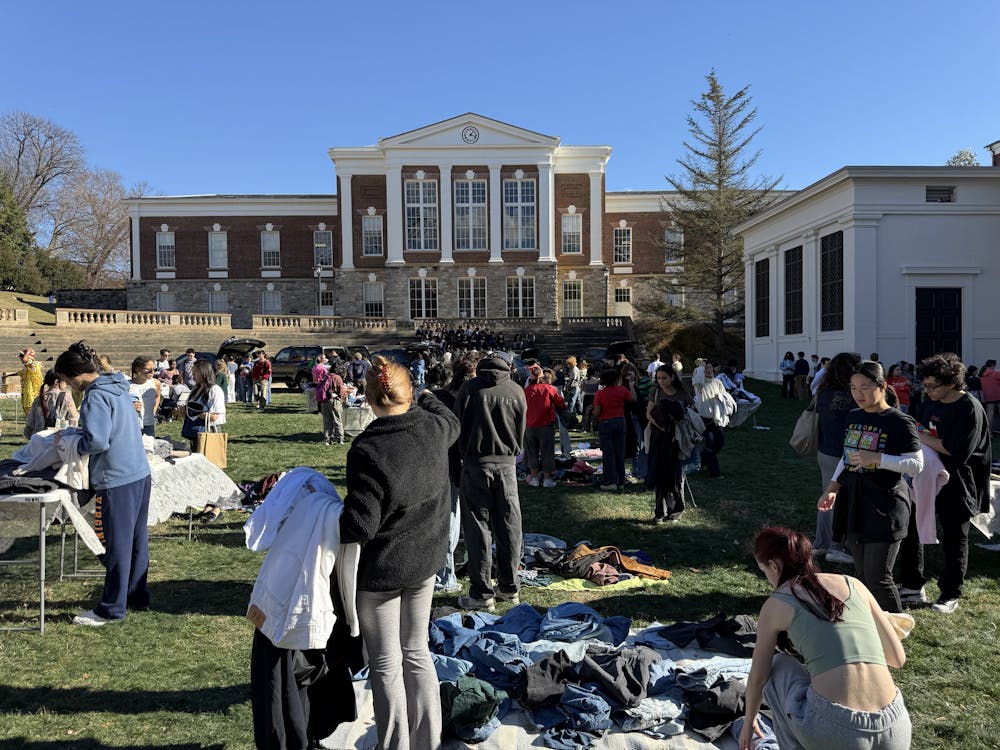 <p>For the event, clothes and accessories were piled on tables, clothing racks, picnic blankets and even in the trunk of cars.</p>