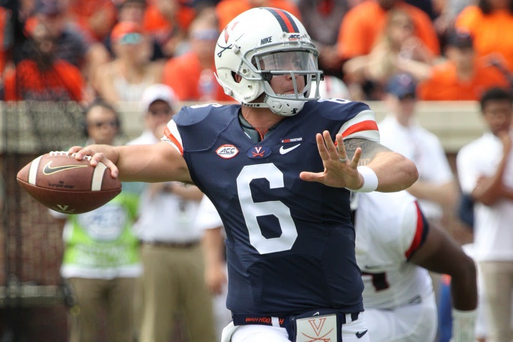 Senior quarterback Kurt Benkert broke a Virginia record with 455 passing yards against Connecticut.
